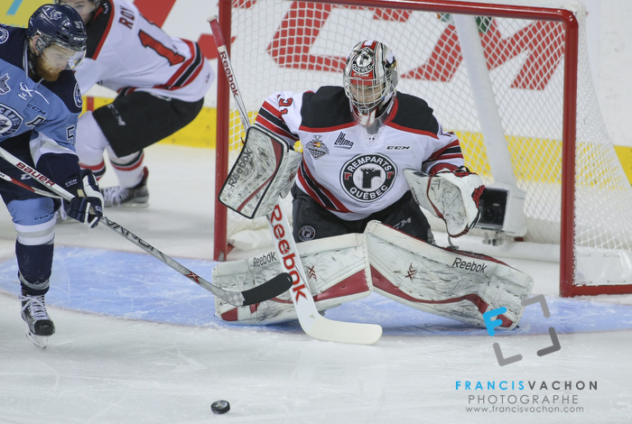 Quebec Remparts goal keeper Zachary Fucale eyes the puck in first period action at the Memorial cup tiebreaker at Le Colisee Pepsi in Quebec city Thursday May 28, 2015.