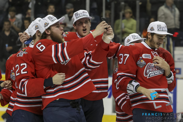 Oshawa Generals Will Petschenig takes a selfie with his teammate after winning the Memorial Cup final in Quebec City  on Sunday May 31, 2015. Francis Vachon/Postmedia Network