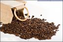 Coffee beans overflowing from a Burlap sack